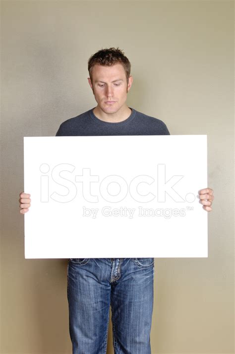 signs handsome man holding blank white stock  freeimagescom