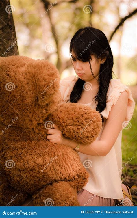 girl   bear stock photo image  asian grass