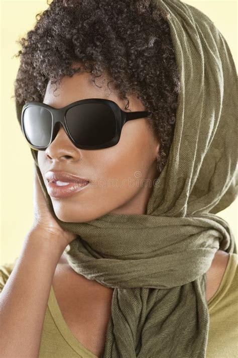 African American Woman Wearing Sunglasses With Stole Over Her Head