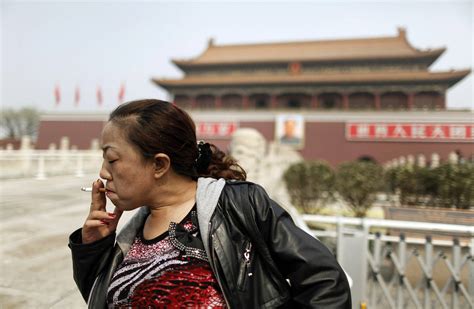 china to issue nationwide smoking ban in public places wsj