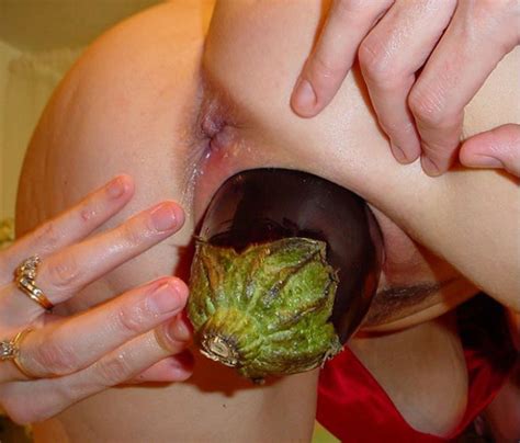 kinky wife shoves an eggplant inside her vagina