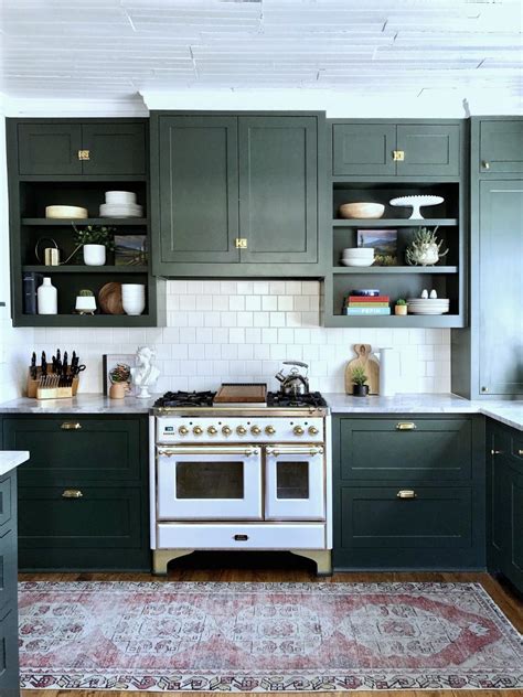 chef kitchen  green cabinetry hgtv
