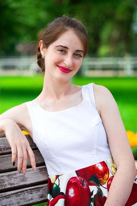 Portrait Of A Happy Young Brunette Woman Summer Park Outdoors Stock