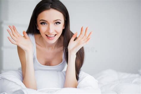 Good Morning Portrait Of A Smiling Pretty Young Brunette Woman