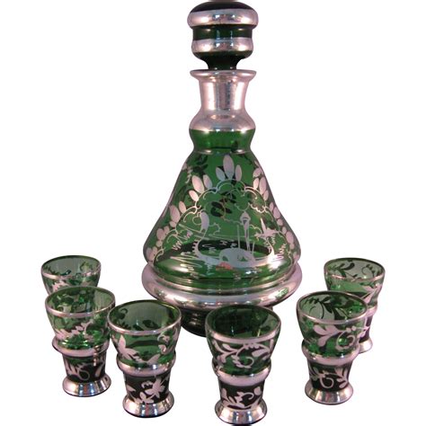 vintage italian emerald green glass with silver overlay decanter and 6