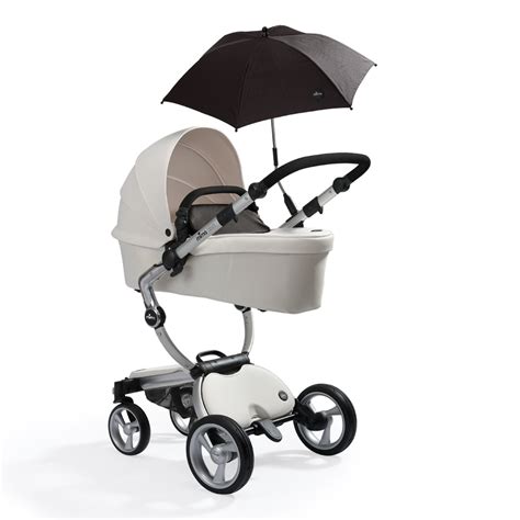 white mima xari  carrycot mode  black softgoods  parasol newborn stroller baby