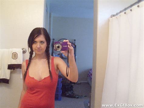 busty chick with her digital camera takes hot mirror selfies of her titties