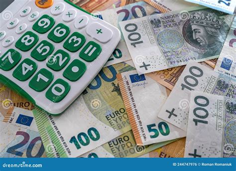 calculator  polish zloty  euro banknotes stock photo image  credit accountant