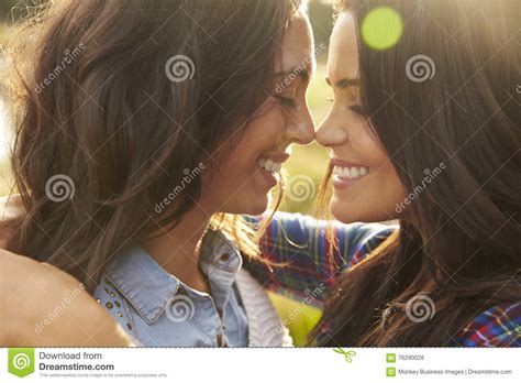 Lesbian Couple Embrace Touching Noses Eyes Closed Close