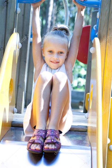 girl playing   playground stock photo  iuliia