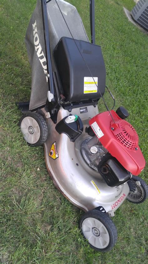 lawn mower honda gcv  twin blade advantage selfpropelled bag   gas container