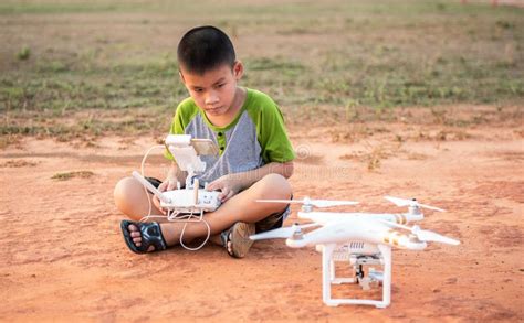 portrait  kid  quadcopter drone outdoors stock image image  moving blue