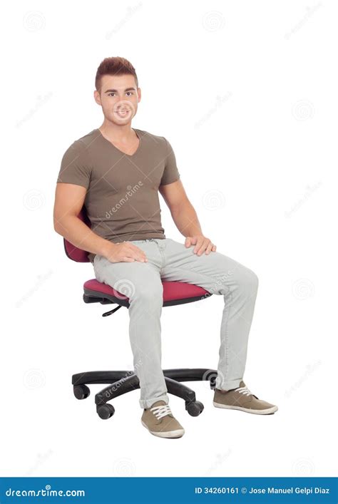casual young man sitting   office chair stock image image