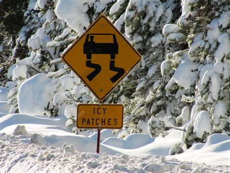 caution icy patches warning sign stock photo  chrisga