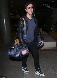 Chris Martin Makes A Cool Arrival Into Los Angeles As He Wears