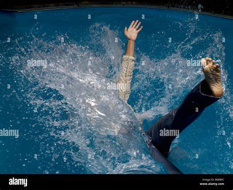 man falling  water slow motion stock photo  alamy