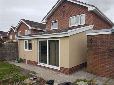 single storey rear extension  pitched roof  face brick home rear