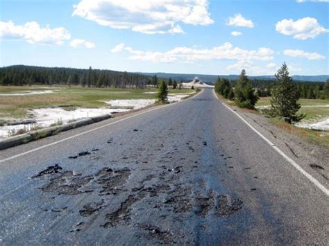 underground thermals at yellowstone national park melt tarmac road