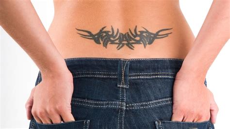 Lower Back Cover Up Tattoo Designs For Women