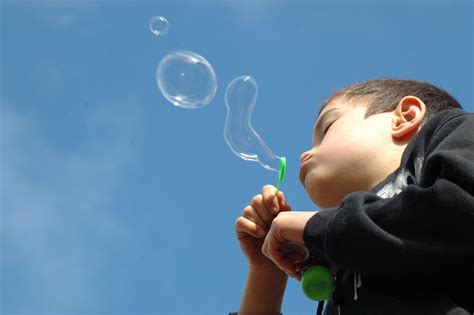 blowing bubbles  photo  freeimages