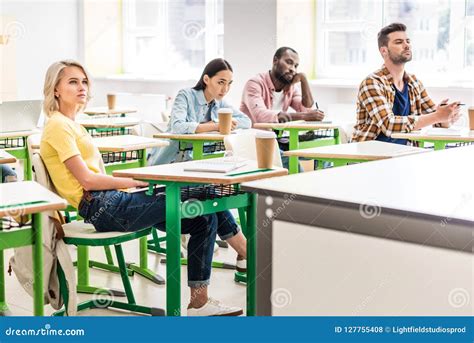young students sitting  classroom stock photo image  classmates