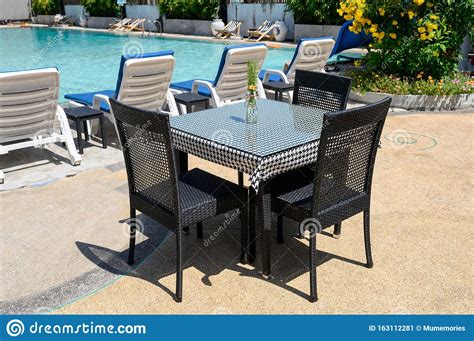 table  chairs  swimming pool stock image image  sunbed