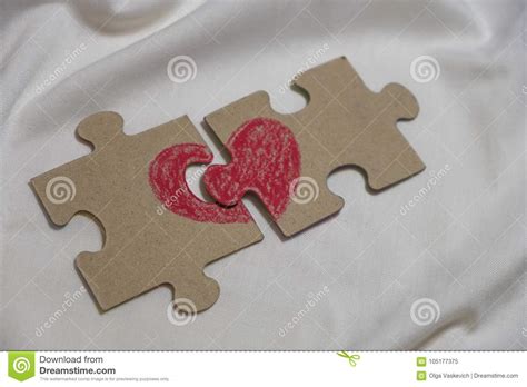 red heart  drawn  pieces   puzzle lying   distance stock image image  background