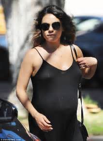 pregnant mila kunis steps out in clinging black maxi dress in la daily mail online