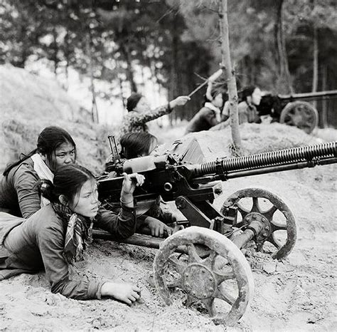 vietnam war photo viet cong village defense forces lie behind their dshk 38 machine guns