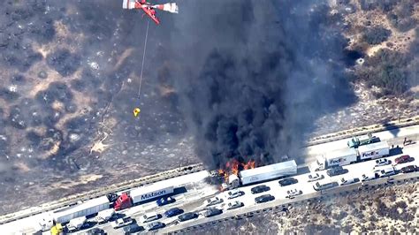 cars catch fire  california wildfire jumps freeway nbc news