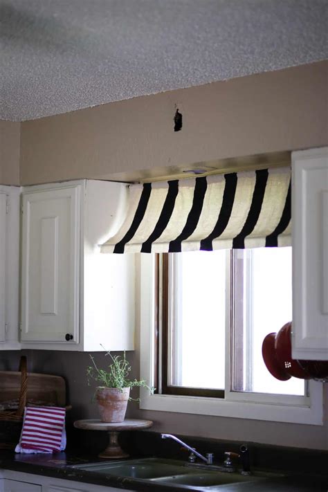 diy black  white striped kitchen window awning   drop cloth  chic obsession