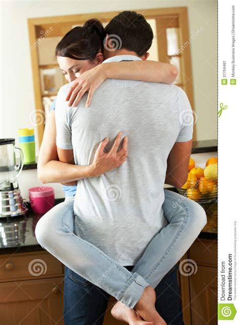 Romantic Couple Hugging In Kitchen Stock Image Image Of