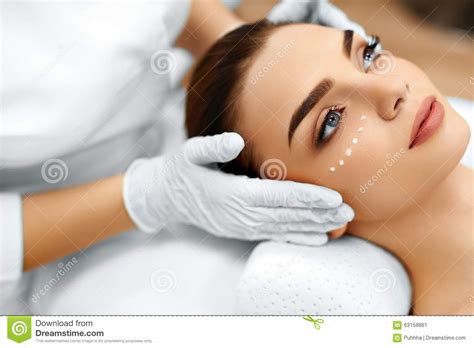 skin care cosmetic cream  woman  face beauty spa treatment stock