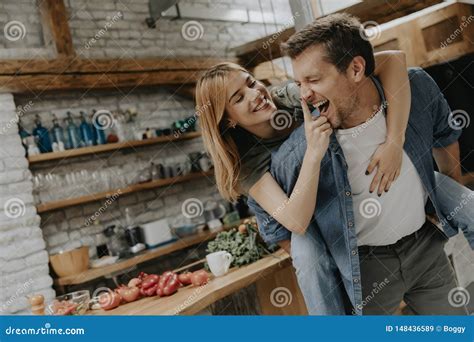 Lovely Couple Having Fun Together At Rustic Kitchen Stock Image Image