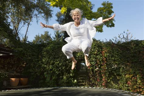 bcbsks blog cheerful overweight senior woman jumping on trampoline