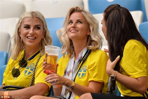 swedish wags get champagne flowing as they cheer on their husbands