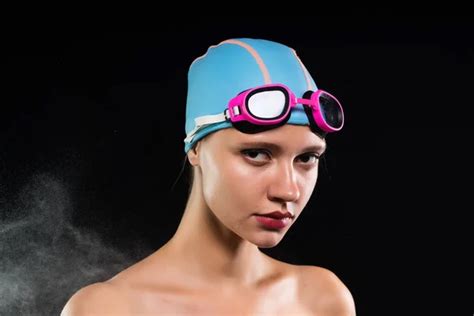 Young Confident Girl Swimmer In Swimming Cap Looking Forward Stock