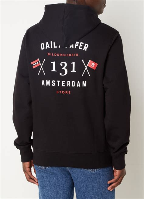 daily paper amsterdam flagship store hoodie met logo en backprint zwart debijenkorfbe