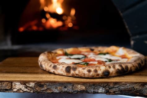 wood fired pizza tastes  cucina dolce