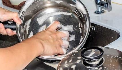clean stainless steel pan  scrubbing