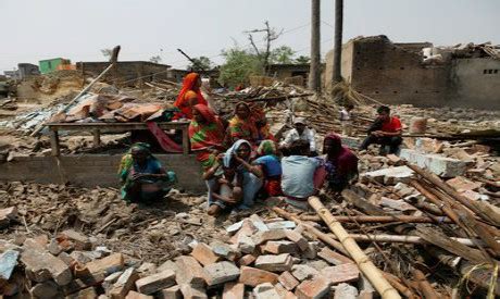 rescuers struggle  reach storm hit area  nepal  dead international world ahram