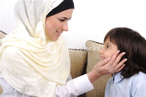 Muslim Mother And Son Relaxing At The Home Royalty Free Stock Image