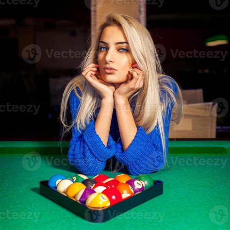 Portrait Of Young Beautiful Blonde Girl With Pyramid Of Pool Balls
