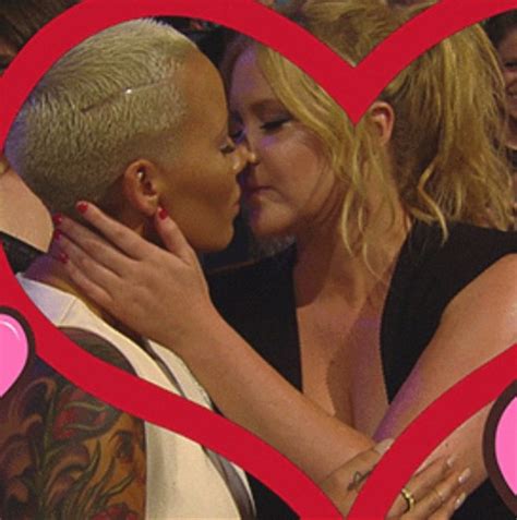 amber rose and amy schumer kiss at the 2015 mtv movie