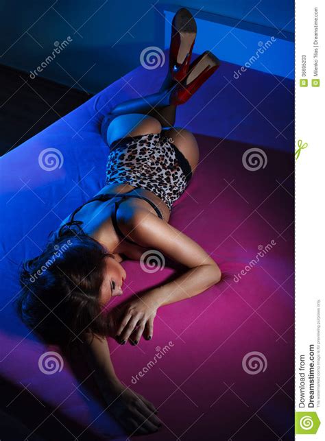 women lying on a bed stock image image of brown high 36695203