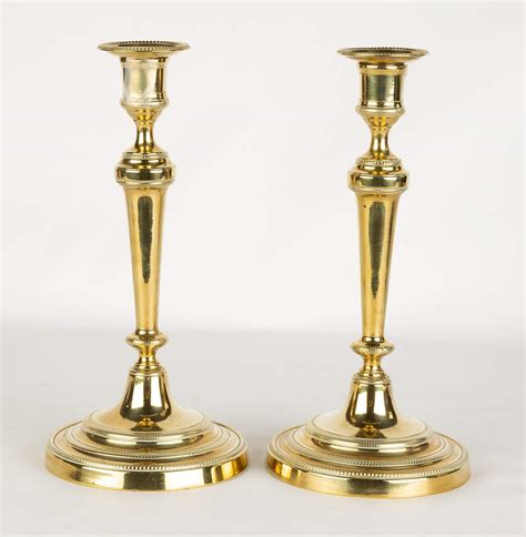 Pair Of Early French Brass Candle Sticks Cottone Auctions