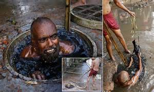 bangladesh sewer cleaners dive into filth to claw out blockages daily