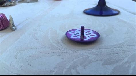 spinning top slow motion youtube