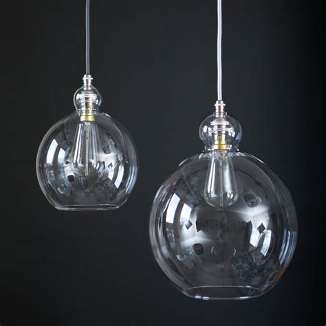 Small Or Large Clear Glass Globe Pendant Light By Glow Lighting