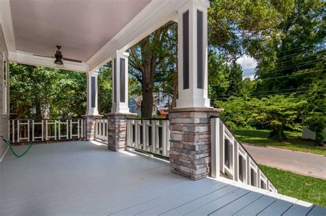 front porch with stone columns artistic contractors